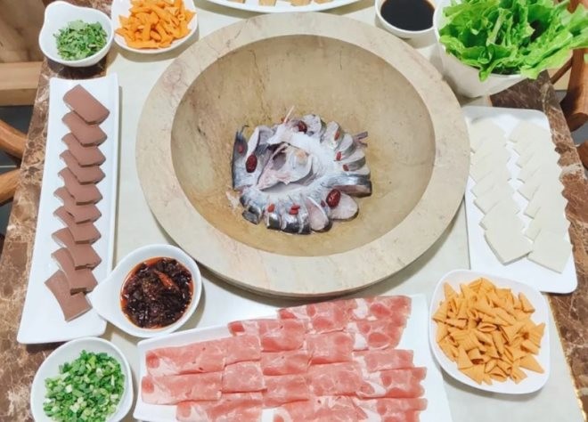 昕时器蒸汽石锅鱼